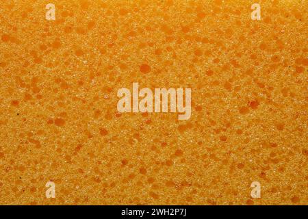 Close up of texture of yellow sponge as a background. Stock Photo