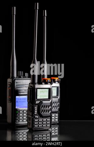 Walkie-talkie - Two-way radios on the black background Stock Photo