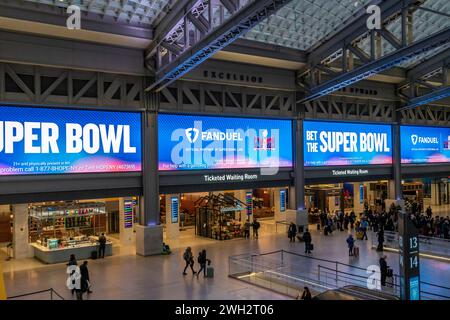 Advertising for FanDuel, online sports gambling, in the Moynihan Train Hall of Pennsylvania Station in New York on Tuesday, January 30, 2024, prior to the Super Bowl. FanDuel is a brand of Flutter Entertainment, formerly formerly Paddy Power Betfair plc. (© Richard B. Levine) Stock Photo