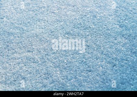 Fresh snow texture in blue tone. Winter background. Stock Photo