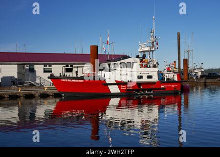 The Coast Guard vessel Cape Palmerston tied up to the Small Craft Harbour Dock in Campbell River on a bright day. Stock Photo