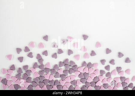 Colorful sugar sprinkles on white background Stock Photo