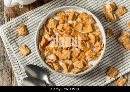 Healthy Brown Cinnamon Toast Breakfast Cereal with Whole Milk Stock Photo