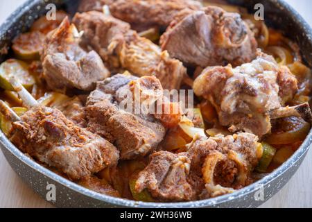 Meat vegetables tray  cooked in oven on wooden background  with mock up space Stock Photo