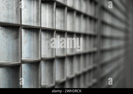 Fence made from zinc plated grid metal. Stock Photo