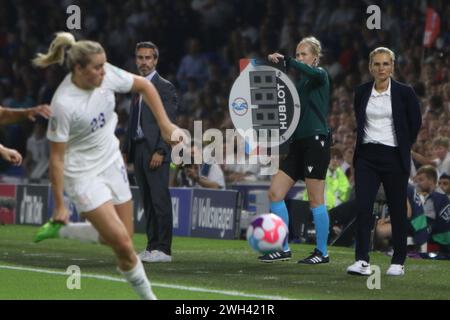 Fourth official gets substitues board ready England v Spain UEFA Womens Euro Brighton Community Stadium (Amex Stadium) 20 July 2022 Stock Photo