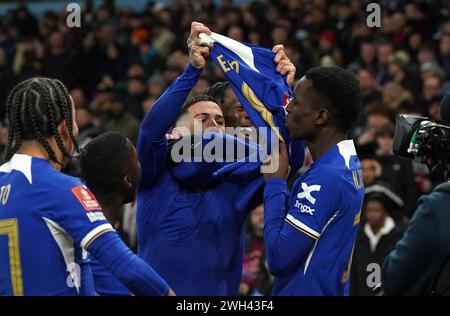 Chelsea's Enzo Fernandez (centre) celebrates with tema-mate Nicolas Jackson (right) after scoring their side's third goal of the game from a free-kick during the Emirates FA Cup fourth round replay match at Villa Park, Birmingham. Picture date: Wednesday February 7, 2024. Stock Photo