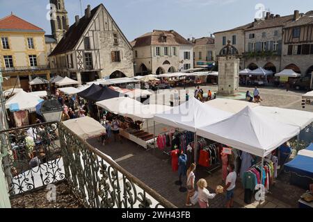 Eymet, the most English of French bastides. Market day on the central ...