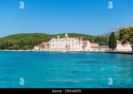 Beautiful, stone made Badija island monastery, with red clay rooftop, popular tourist destination in Korcula island archipelago Stock Photo