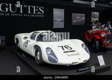 Paris, France - Rétromobile 2024. Focus on a white 1967 Porsche 910 Prototype. Chassis no. 910-001. Stock Photo
