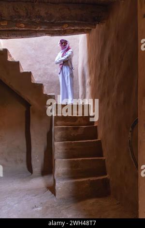 Traditional mud brick staircase inside a heritage house in Shaqra, a ...