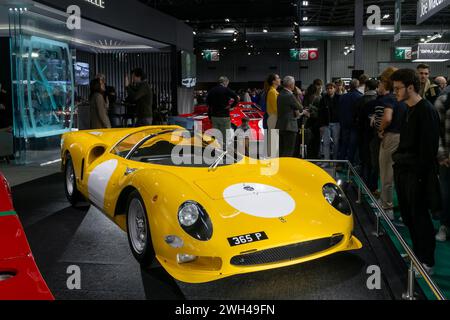 Paris, France - Rétromobile 2024. Focus on a yellow 1965 Ferrari 365 P. Chassis no. 0828. Stock Photo