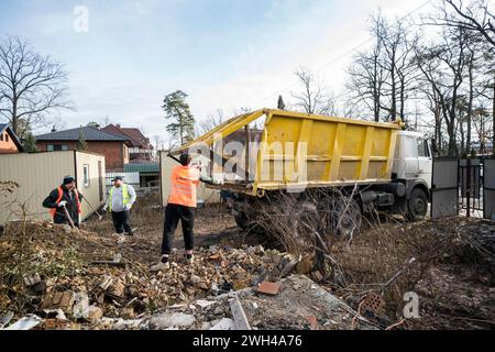 Irpin, Kyiv Oblast, Ukraine. 7th Feb, 2024. Volunteers from Dobrobat work on cleaning up and rebuilding houses that have been destroyed by the Russian military at the beginning of the full-scale invasion of Ukraine in Irpin close to the capital Kyiv. (Credit Image: © Andreas Stroh/ZUMA Press Wire) EDITORIAL USAGE ONLY! Not for Commercial USAGE! Stock Photo