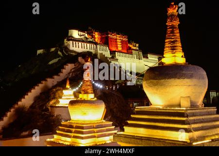 Once home to the Dalai Lama, Potala Palace was designated a UNESCO World Heritage Site in 1994 and is a popular tourist attraction in Lhasa. Stock Photo