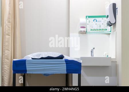 An empty bed in a specialist doctor's office Stock Photo