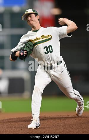 Arkansas Tech Wonder Boys LHP Jack Rector (30) during the Houston Winter Invitational baseball game between Southern New Hampshire Penmen and the  Ark Stock Photo