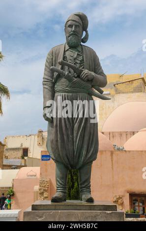 Greece: Anagnostis Mantakas (1817 - 1916), Cretan freedom fighter, forecourt of Trimatiri Cathedral, Chania, Crete.  In 1913, Anagnostis Mantakas with the help of Hatzi Mihalis Giannaris, raised the Greek Flag over the Firkas Fort in Chania. This signalled the reunification of Crete with Greece. Stock Photo