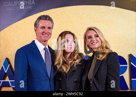 Governor Gavin Newsom poses with First Partner Jennifer Siebel and