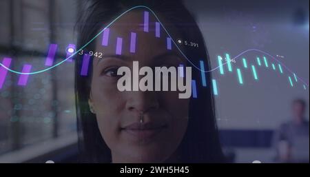 Image of data processing over biracial woman Stock Photo