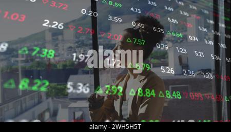Image of data processing over african american businesswoman Stock Photo