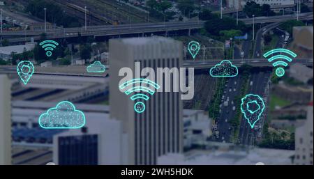 Image of digital clouds and icons flying over cityscape Stock Photo