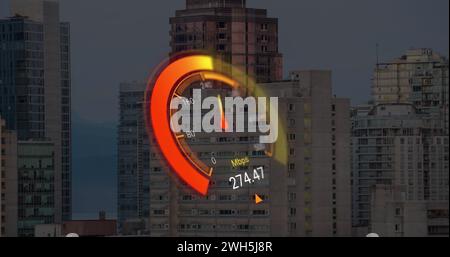 Image of orange speedometer over cityscape Stock Photo