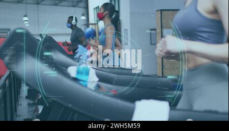 Image of covid-19 cell spinning over diverse group wearing face masks working out Stock Photo