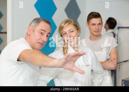 portrait of painter with apprentices Stock Photo