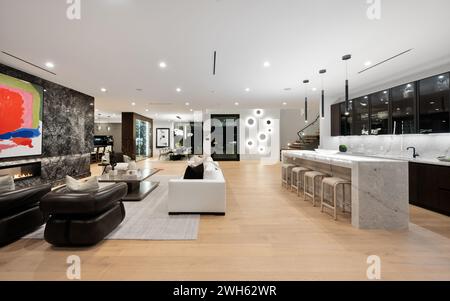 An open floor plan with a contemporary design and a marble countertop. Tarzana, Los Angeles, California Stock Photo