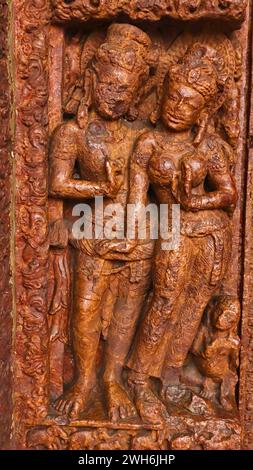 Carving Sculpture of Ancient Couple on the Laxman Temple, Sirpur, Mahasamund, Chhattisgarh, India. Stock Photo