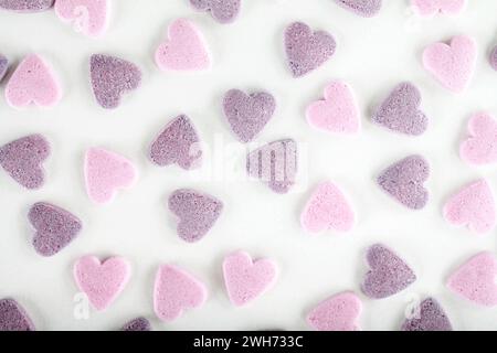 Colorful sugar sprinkles on white background Stock Photo