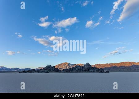 The Grandstand, a quartz monzonite island in the Racetrack Playa in Death Valley National Park in the Mojave Desert, California. Stock Photo