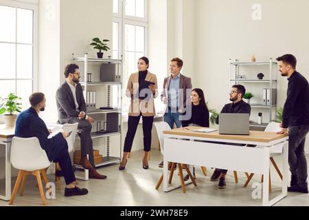 Business colleagues having discussion during meeting in office Stock Photo