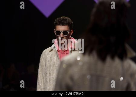 Models show collections by designer Marcel  Ostertag on the catwalk at the Verti Music Hall Stock Photo