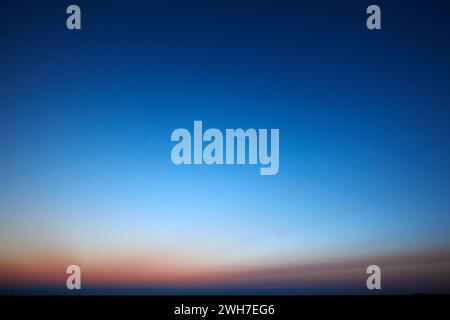 blues and reds in the post midnight sky in summer in the land of midnight sun Iceland Stock Photo