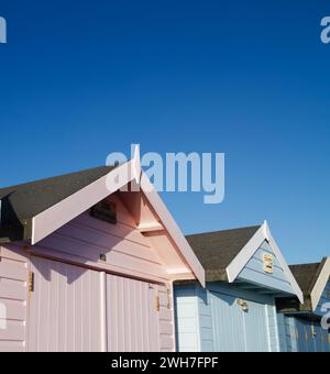 Colorful Wooden Beach Huts Along Avon Beach On A Summers Day, Avon Beach, Christchurch, UK Stock Photo