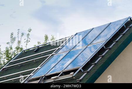 Solar panel on the roof of the house. Stock Photo