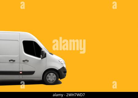Side view of white delivery truck on yellow background. Delivery concept Stock Photo
