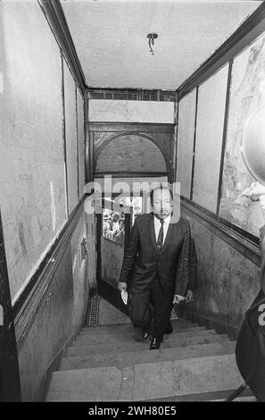 Dr. Martin Luther King Jr. Entering a Modest Apartment During Fair Housing Movement Chicago Stock Photo