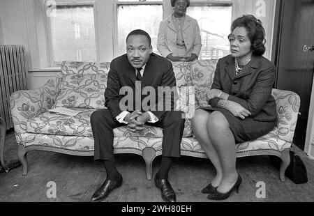 Dr. Martin Luther King Jr. Seated With Coretta Scott King in a Modest Living Room During Fair Housing Movement Stock Photo