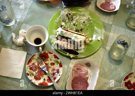 Top view of a table with dishes on which food was left after dinner. Stock Photo
