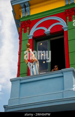 Have a selfie with Lional Messi holding the World Cup. La Boca is a working-class area with colourful attractions near the Riachuelo River. Stock Photo