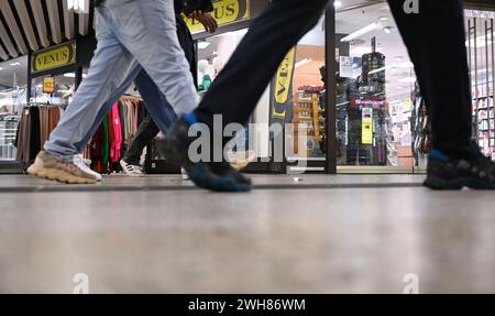 Stuttgart, Germany. 08th Feb, 2024. Passers-by walk past retail outlets in the Klett Passage at Stuttgart Central Station. Credit: Bernd Weißbrod/dpa/Alamy Live News Stock Photo