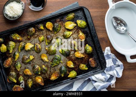 Roasted brussel sprouts on a sheet pan fresh out of the oven. Stock Photo
