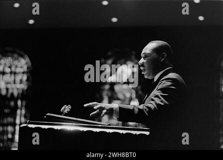 Dr. Martin Luthur King Delivers an Inspiring Speech at a Historic Church Podium Stock Photo