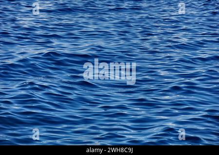 Wavy surface with rippled waves and light reflection on the top Stock Photo