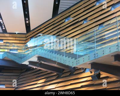 View of the interior of the V&A museum in Dundee, with a floating staircase in the main atrium designed by Kengo Kuma architects. Stock Photo