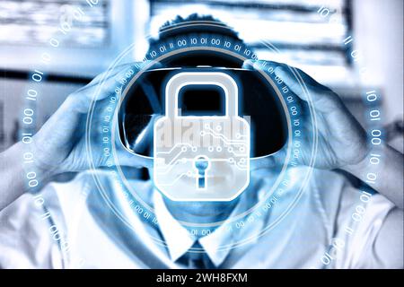 Businessman with VR glasses and  lock icon interface with circle binary numders. Cyber security protection concept. Stock Photo