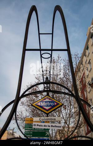 Metro station sign in Madrid, a station called 'Colombia' that has been painted with its flag Stock Photo