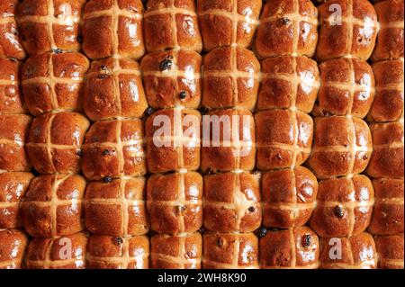 Glazed fruit hot cross buns made with yeast and sourdough Stock Photo